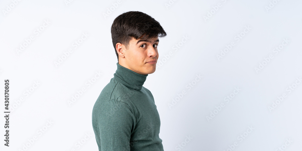 Handsome man over isolated blue background . Portrait Handsome man over isolated blue background . Portrait