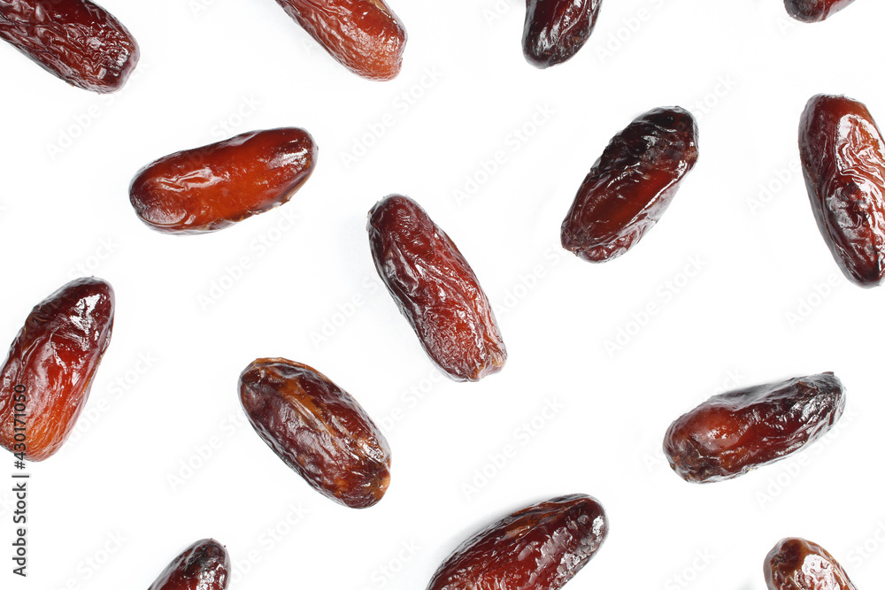 Background pattern made of shiny dates isolated on white background Background pattern made of shiny dates isolated on white background