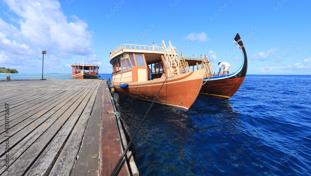 wooden boat on a tropical island, Maldives