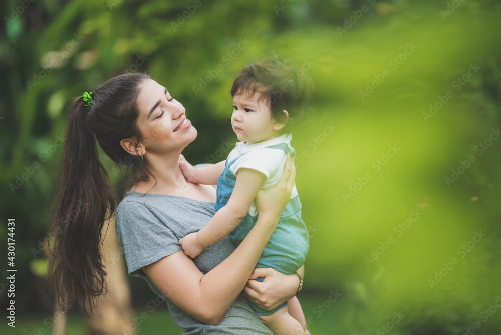 family of child baby and mother, woman parent raising and playing with son, home, young mother and a little boy person are happy at home, cheerful childhood lifestyle together family of child baby and mother, woman parent raising and playing with son, home, young mother and a little boy person are happy at home, cheerful childhood lifestyle together