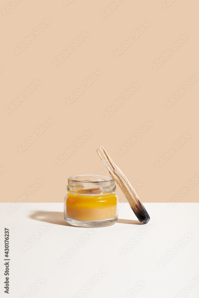 Palo santo holy wood sticks with candle for spiritual meditate practice. Concept of mental health Palo santo holy wood sticks with candle for spiritual meditate practice. Concept of mental health