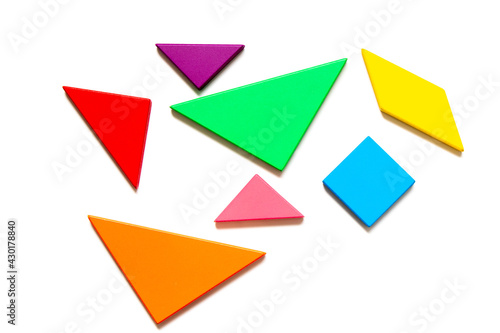Color wood tangram puzzle in geometric shape wait to build on white background Free Download Color wood tangram puzzle in geometric shape wait to build on white background - GFXLoad