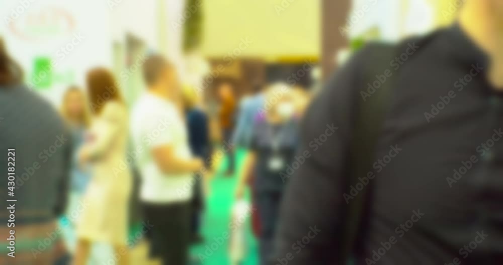 Modern city life. Abstract blurred background on business theme. Blurry defocused video. Unrecognizable people in a large modern building. Modern city life. Abstract blurred background on business theme. Blurry defocused video. Unrecognizable people in a large modern building.