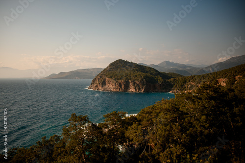 Beautiful scenery of bay and mountains with trees. Mediterranean sea coast. Nature of Turkey.
