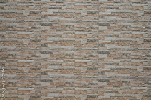 Rock stone natural color brick wall texture for background. 