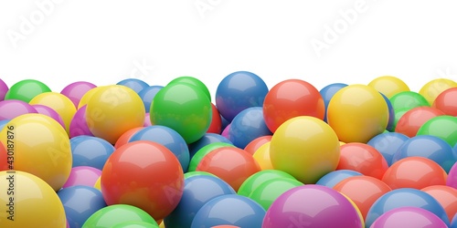 Foto Ball pool or pit filled with red, green, yellow, pink and blue plastic balls, ab