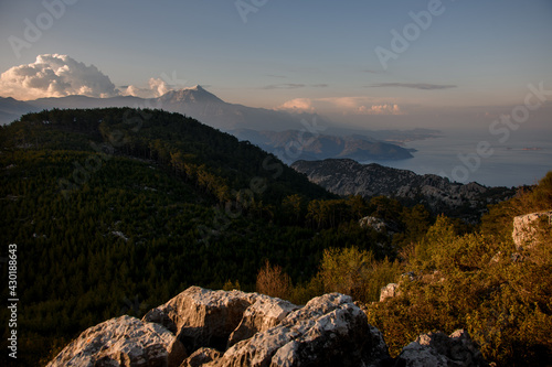 magnificent view of the mountain landscape, hills, sea coast and blue sky © fesenko
