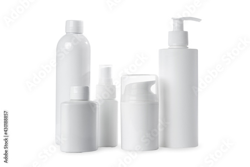 empty white plastic bottles for cosmetics on white background. Isolated and mockup