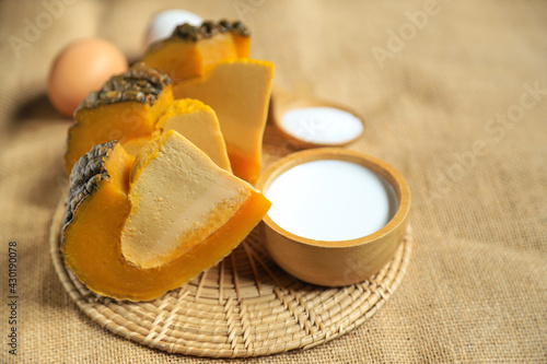 Tablou canvas Stream pumpkin custard with coconuy milk and eggs on sack for eating in freetime
