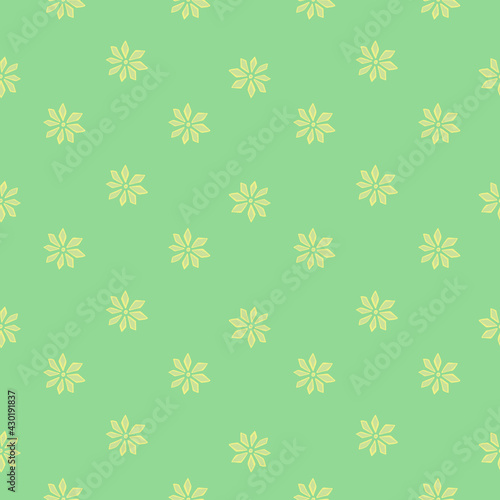 Spring cute seamless pattern with little yellow simple carnation flowers print. Light green background.