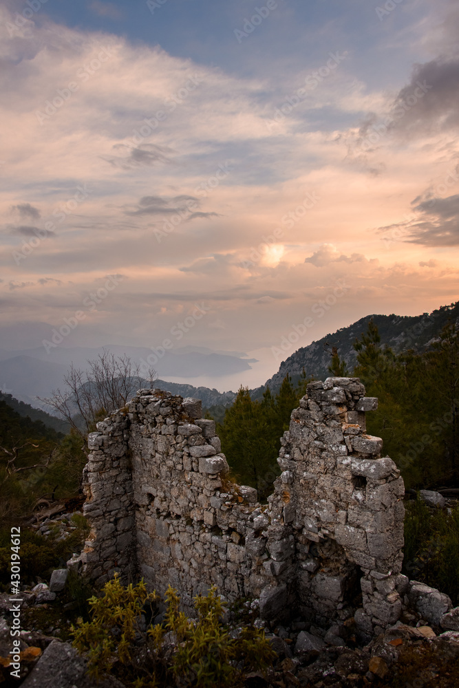 Great view of old building ruins on mountain. Beautiful landscape on background Great view of old building ruins on mountain. Beautiful landscape on background