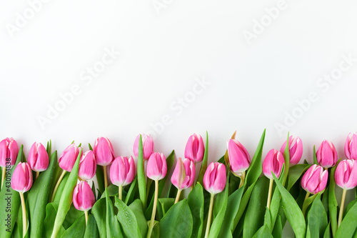 Fototapeta Naklejka Na Ścianę i Meble -  spring flat lay with tulips on white