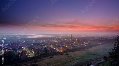 Night view over Portsea Island and Portsmouth Harbour from Portsdown Hill, Hampshire, UK photo