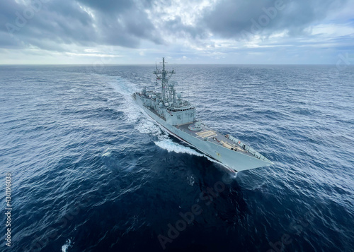 military us navy ship sailing in the ocean during nato operation