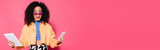 confused african american woman in sunglasses holding smartphone and digital tablet on pink, banner