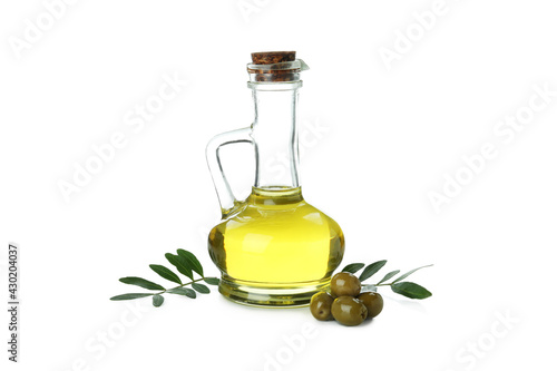 Glass bottle of olive oil isolated on white background