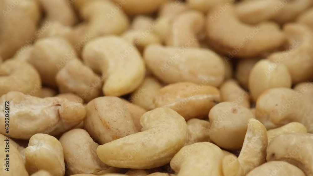 raw cashew nuts close up, rotation. Healthy Food. 4K UHD video raw cashew nuts close up, rotation. Healthy Food. 4K UHD video