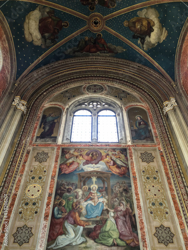 Oppulent Bavarian Byzantine Basilica interior style architecture inside Roman Catholic church or cathedral with lots of gold, stucco and plaster built in Round Arch style with huge altar fresco photo