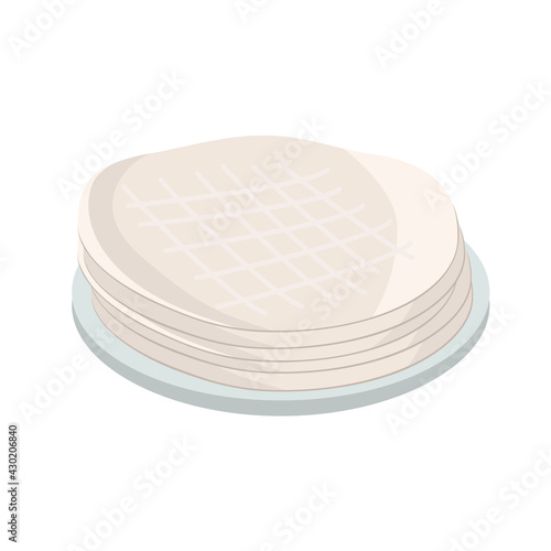 Rice paper wrappers on a plate isolated on white background. Rice food concept.