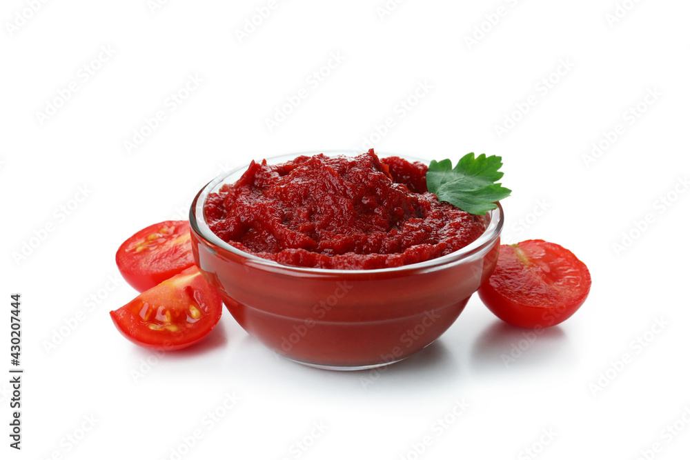 Bowl of tomato paste and tomatoes isolated on white background Bowl of tomato paste and tomatoes isolated on white background