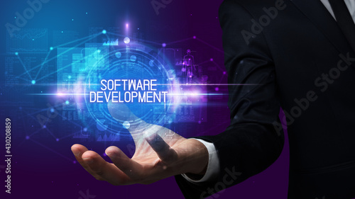 Wallpaper Mural Man hand holding digital technology concept Torontodigital.ca