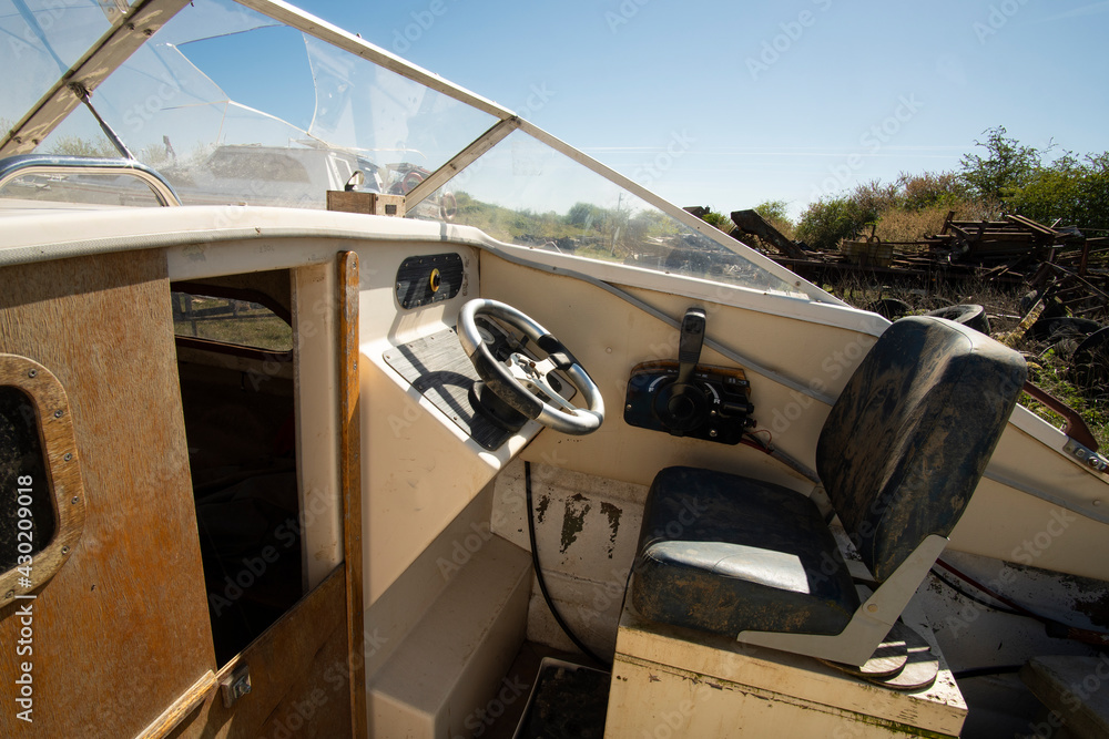 Old open topped motor boat on a sunny day