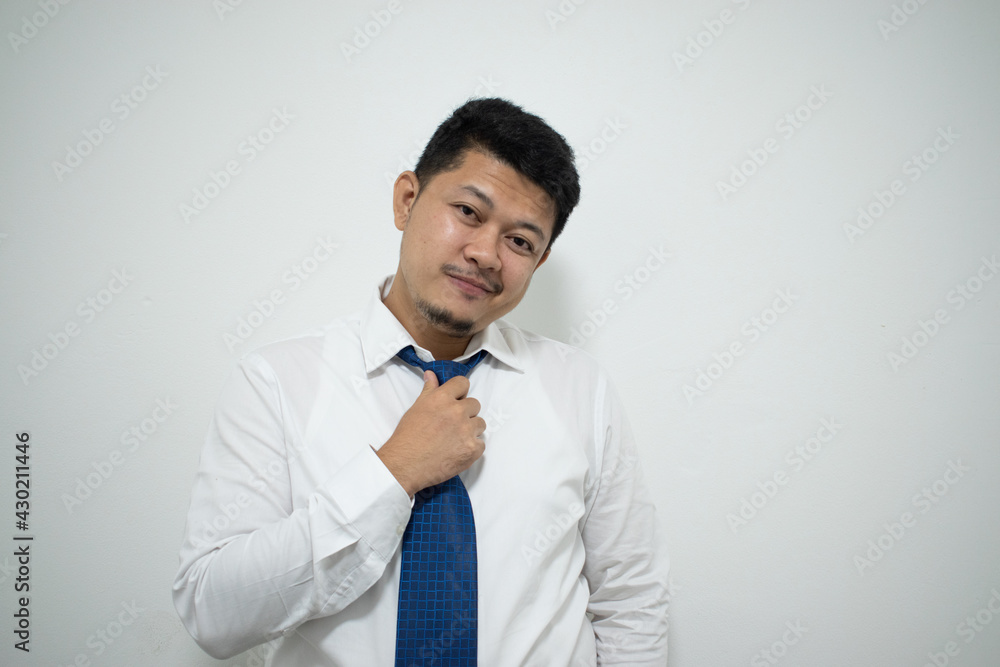 Happy young business man in classic blue shirt tie. Achievement career wealth business concept. Mock up copy space Happy young business man in classic blue shirt tie. Achievement career wealth business concept. Mock up copy space
