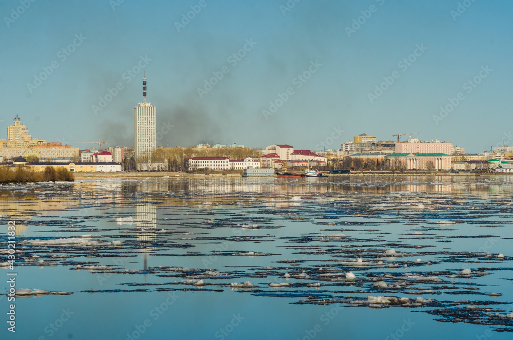 View of the city of Arkhangelsk during the ice drift. Spring. High water 