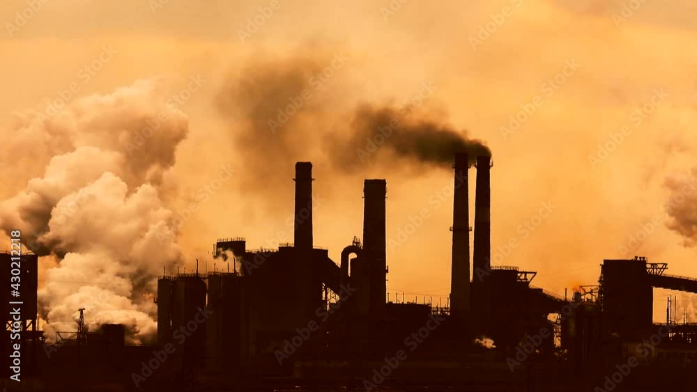 Fuming chimneys. Metallurgical industrial factory. Air pollution concept background. Heavy industry. Processing of minerals. Industrial landscape. Fuming chimneys. Metallurgical industrial factory. Air pollution concept background. Heavy industry. Processing of minerals. Industrial landscape.
