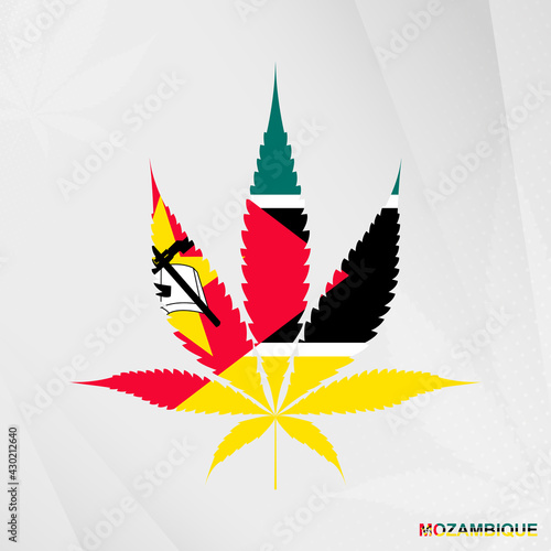 Flag of Mozambique in Marijuana leaf shape. The concept of legalization Cannabis in Mozambique.