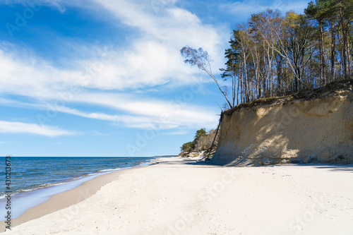 Fototapeta Naklejka Na Ścianę i Meble -  Empty beach on the Baltic Sea, dunes and high cliffs..