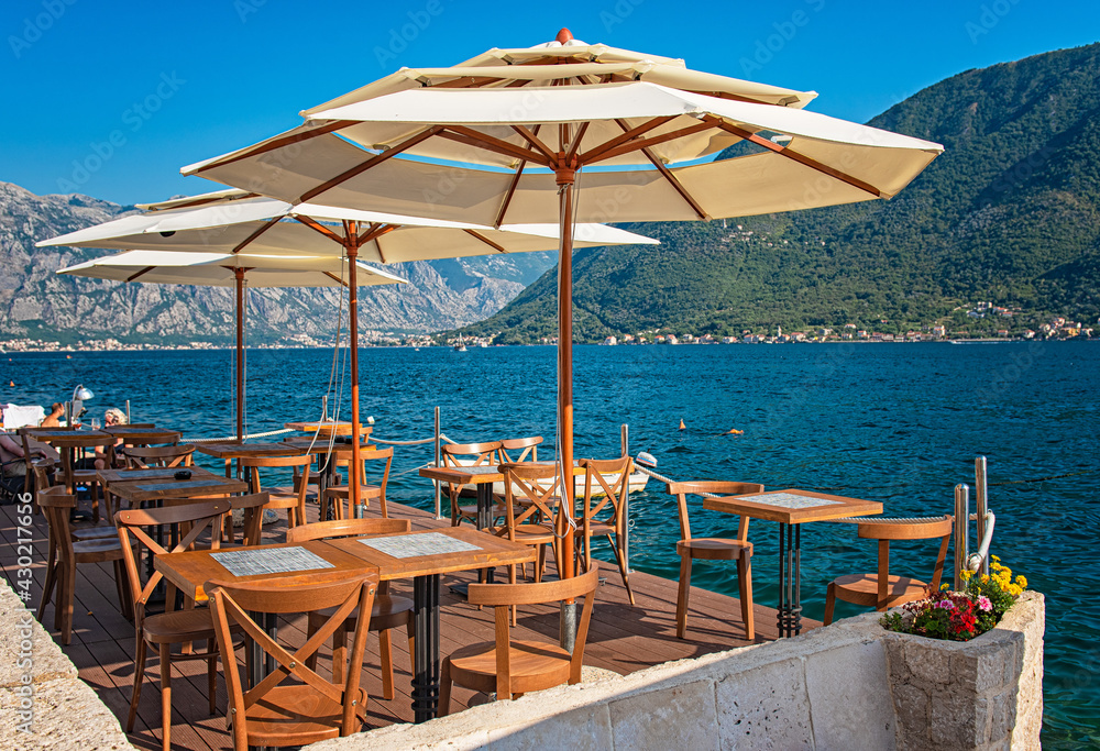 Beautiful restaurant at the sea, afternoon, eating out concept