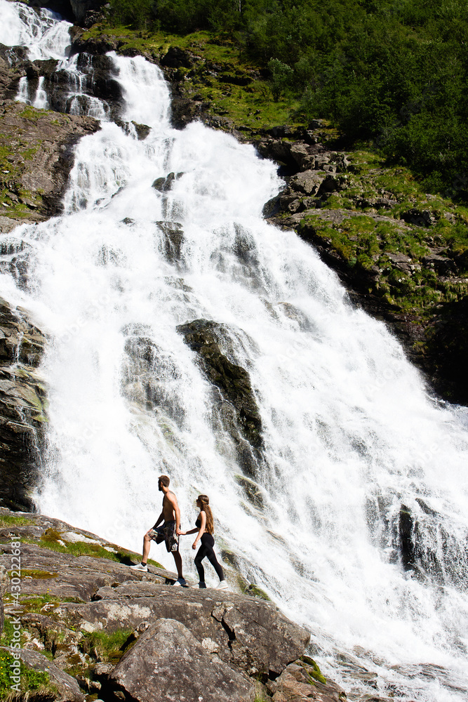 person on the waterfall