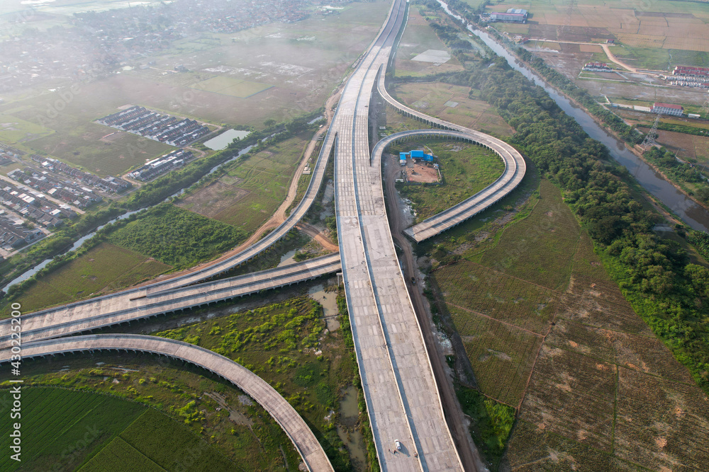 Aerial view on the new road construction site at Bekasi. Aerial view on the new road construction site at Bekasi.