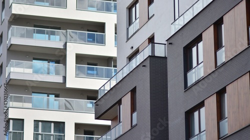 Modern residential apartment house building. Luxurious apartments for sale. New build neighborhood modern style. Real estate market in Europe.