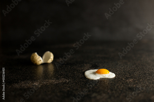 Quail egg frosting. Eggs.Dark background. Space for the text.