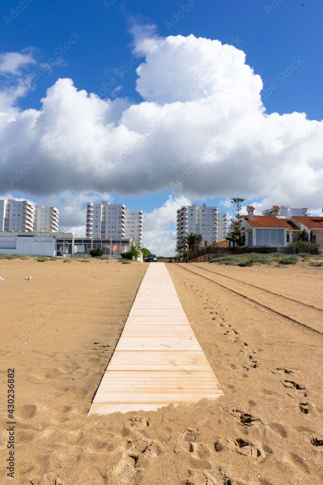 panoramic view of the Punta umbria beaach, Huelva on a sunny day with clouds panoramic view of the Punta umbria beaach, Huelva on a sunny day with clouds