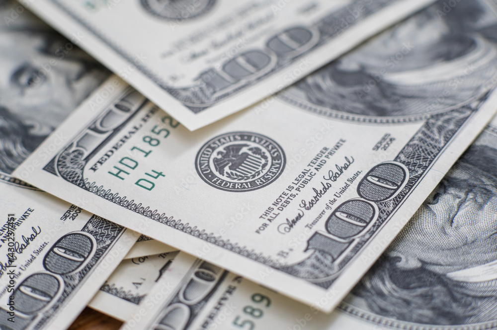 Cash of hundred dollar bills, dollar background image with high resolution. Macro shot Cash of hundred dollar bills, dollar background image with high resolution. Macro shot