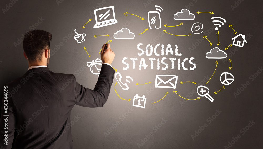 businessman drawing social media icons businessman drawing social media icons