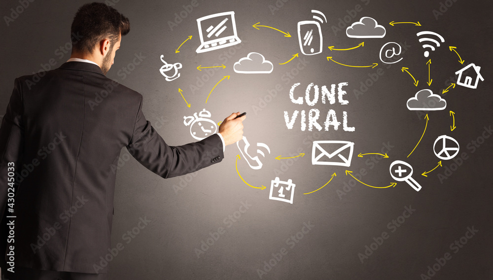 businessman drawing social media icons businessman drawing social media icons