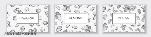 Cards with different nuts, hazelnut, almond, pecan.
