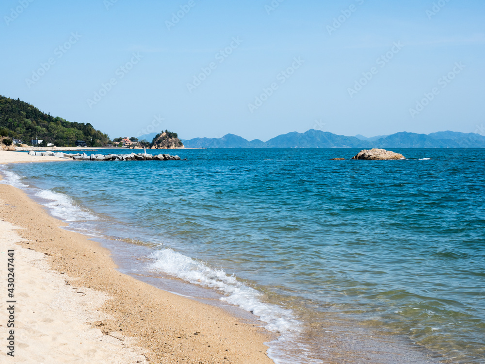Scenic white sand beach on Seto Inland Sea in Toyo - Ehime prefecture, Japan Scenic white sand beach on Seto Inland Sea in Toyo - Ehime prefecture, Japan