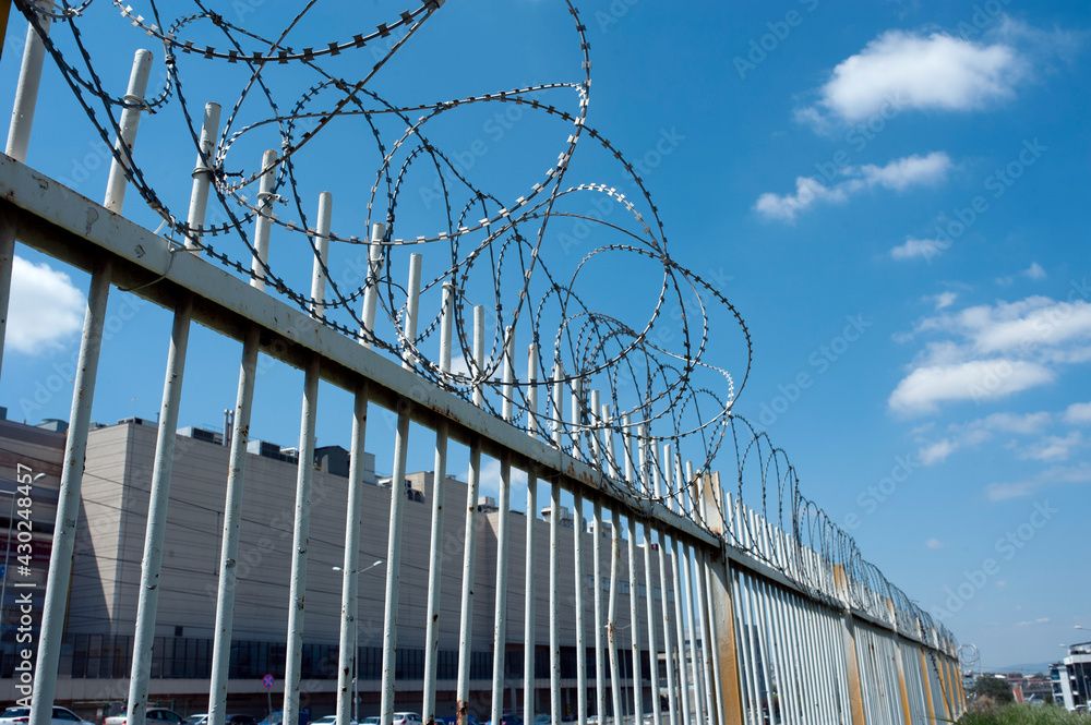 Fence, city life, security lane, restricted area, restricted area, no entry, wired, barbed wire Fence, city life, security lane, restricted area, restricted area, no entry, wired, barbed wire