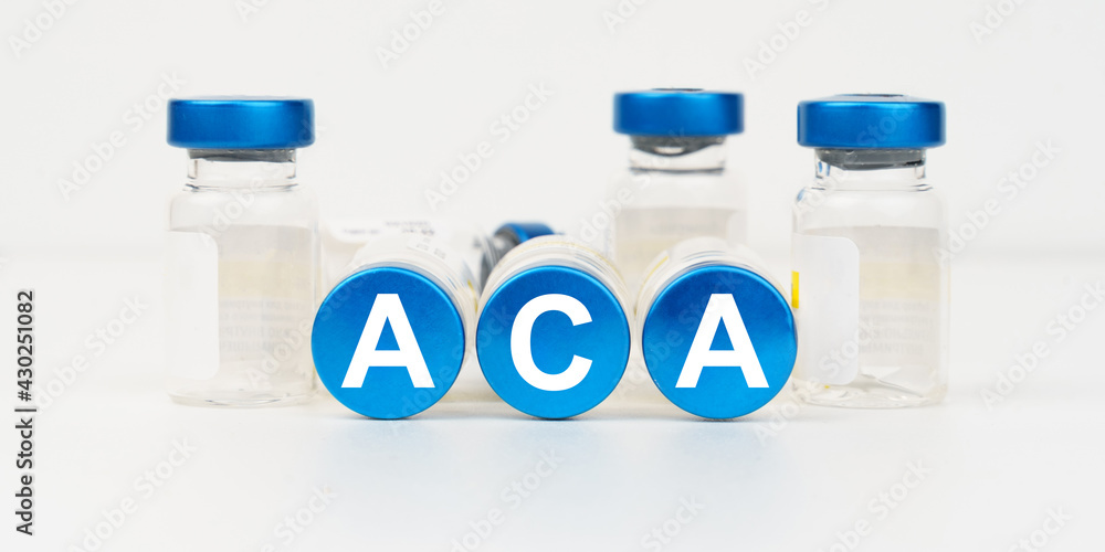 On the blue roofs of the injections it says -ACA On the blue roofs of the injections it says -ACA