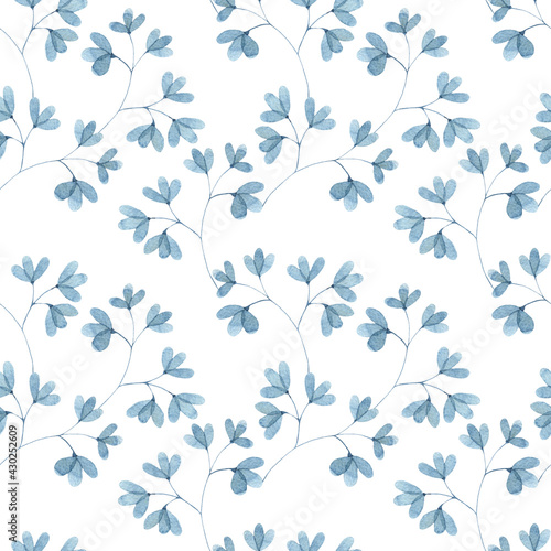 Watercolor seamless pattern with blue leaf twigs, small leaves on a white background. Botanical illustration for fabrics, dresses, interiors