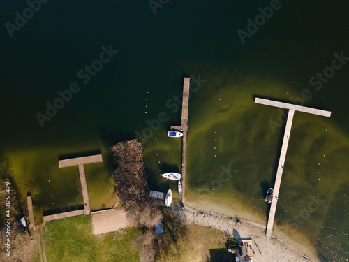 marina for boats, wooden footbridge, Masurian lakes. Aerial view, photos from the drone photo