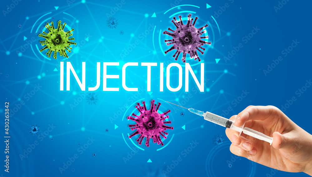 Syringe, medical injection in hand, coronavirus vaccine concept Syringe, medical injection in hand, coronavirus vaccine concept