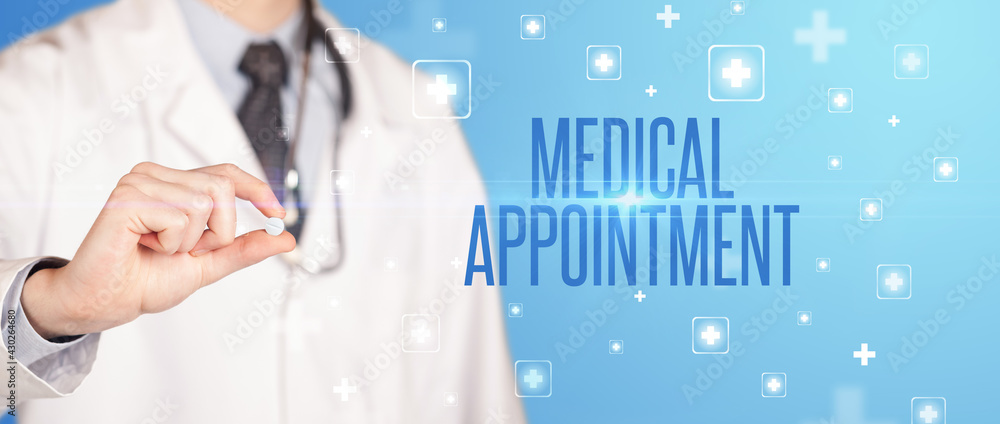 Close-up of a doctor giving a pill Close-up of a doctor giving a pill