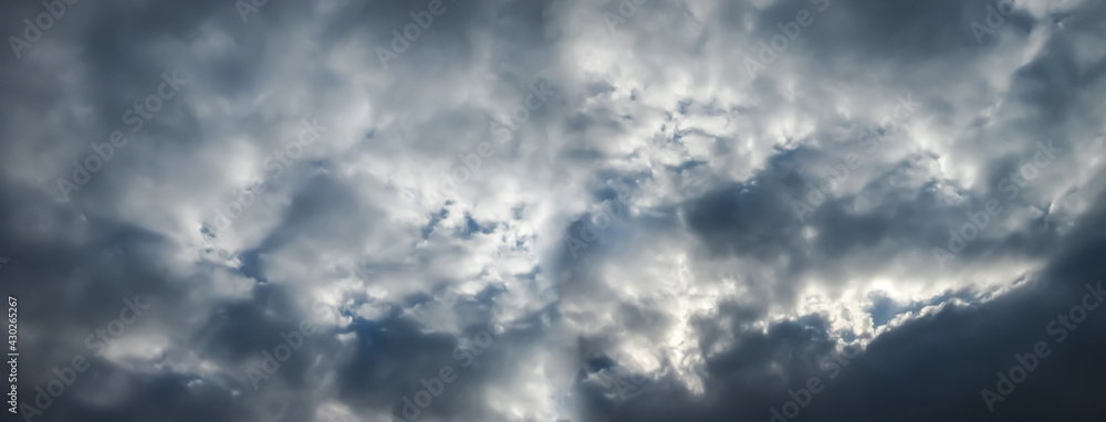 Gloomy sky. Large panorama with gray clouds.