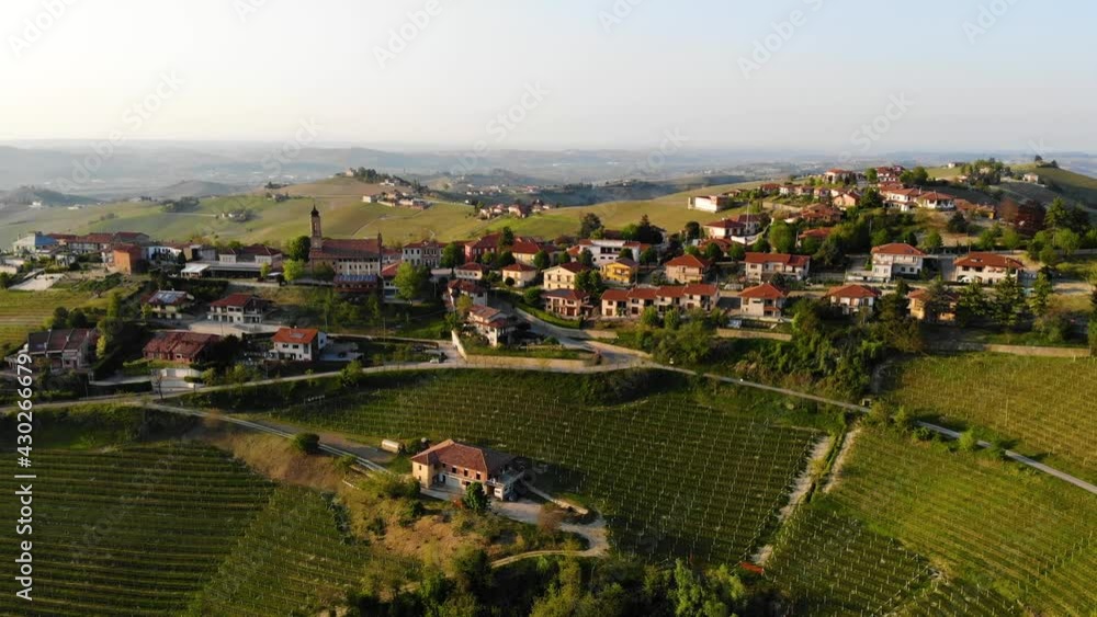 Treiso town landscape, Langhe, Piedmont, Italy. sunset light on vineyards Treiso town landscape, Langhe, Piedmont, Italy. sunset light on vineyards